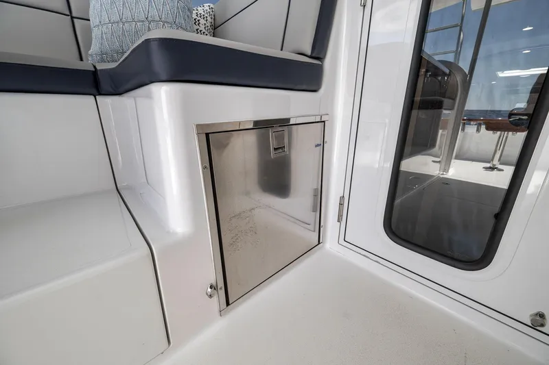 Slide: The Image of Interior view of 2018 Viking 37 Billfish yacht, featuring seating and stainless steel storage. - 40