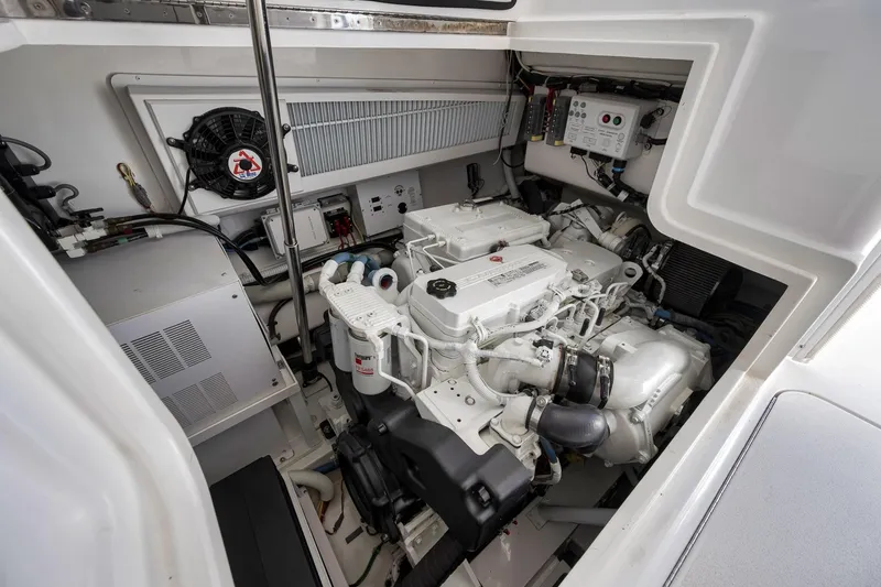 Slide: The Image of Engine room of 2018 Viking 37 Billfish boat, showcasing mechanical components. - 42