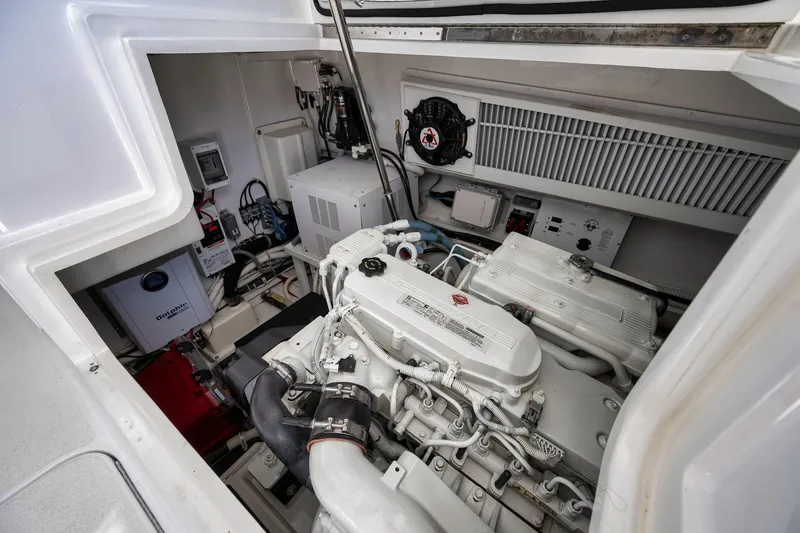 Slide: The Image of Engine room of 2018 Viking 37 Billfish yacht, showcasing mechanical components. - 43