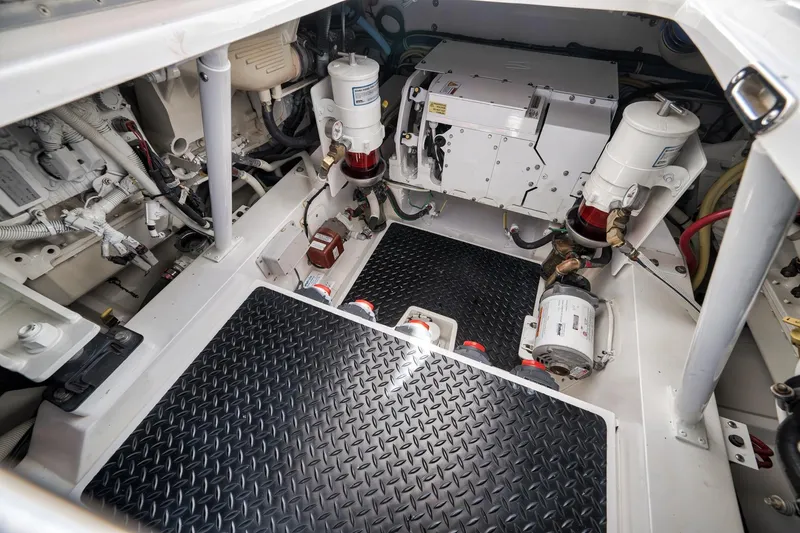 Slide: The Image of Engine room of 2018 Viking 37 Billfish, showcasing mechanical components and equipment. - 48