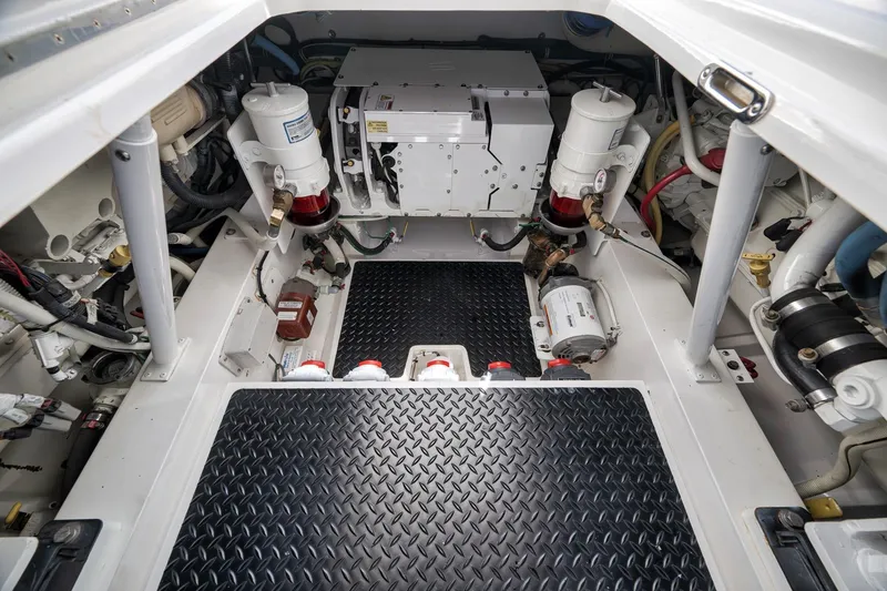 Slide: The Image of Engine room of 2018 Viking 37 Billfish boat, showcasing mechanical components and systems. - 49