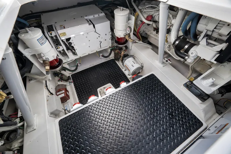 Slide: The Image of Engine room of 2018 Viking 37 Billfish, showcasing mechanical components and equipment. - 50