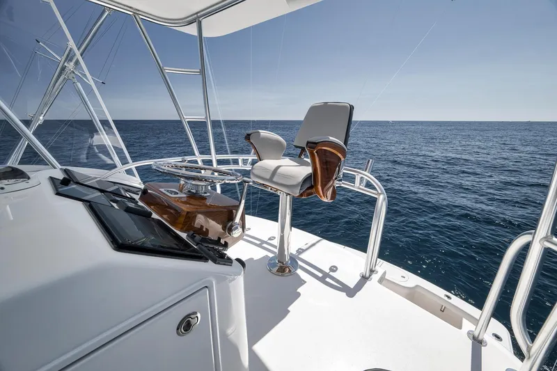 Slide: The Image of Flybridge of 2018 Viking 37 Billfish yacht with ocean view and captain's chair. - 53