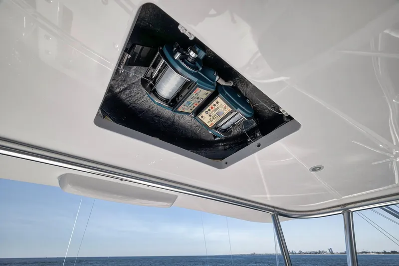 Slide: The Image of 2018 Viking 37 Billfish boat with overhead electronic equipment panel. - 57
