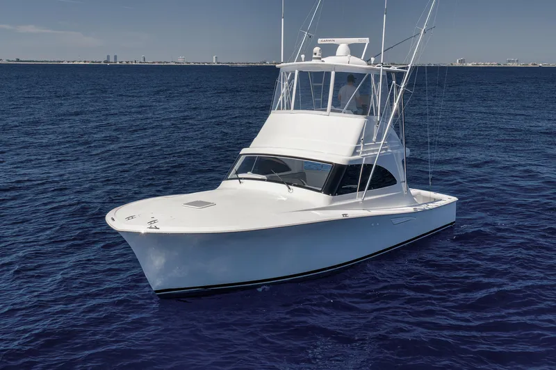 Slide: The Image of 2018 Viking 37 Billfish yacht cruising on open blue sea. - 8