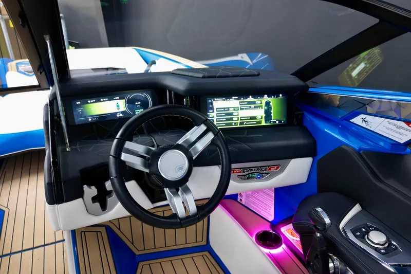 Slide: The Image of 2022 Nautique Super Air Nautique G25 Paragon dashboard with advanced controls and sleek design. - 15