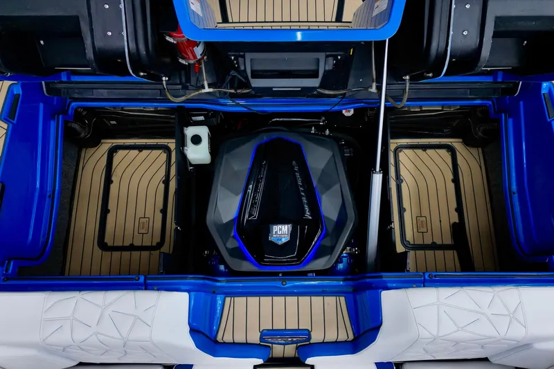 Slide: The Image of 2022 Nautique Super Air Nautique G25 Paragon engine compartment, showcasing PCM engine details. - 19