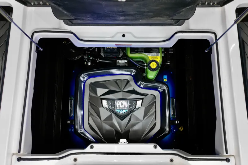 Slide: The Image of 2024 Nautique Super Air Nautique G23 engine compartment with PCM engine detail. - 18