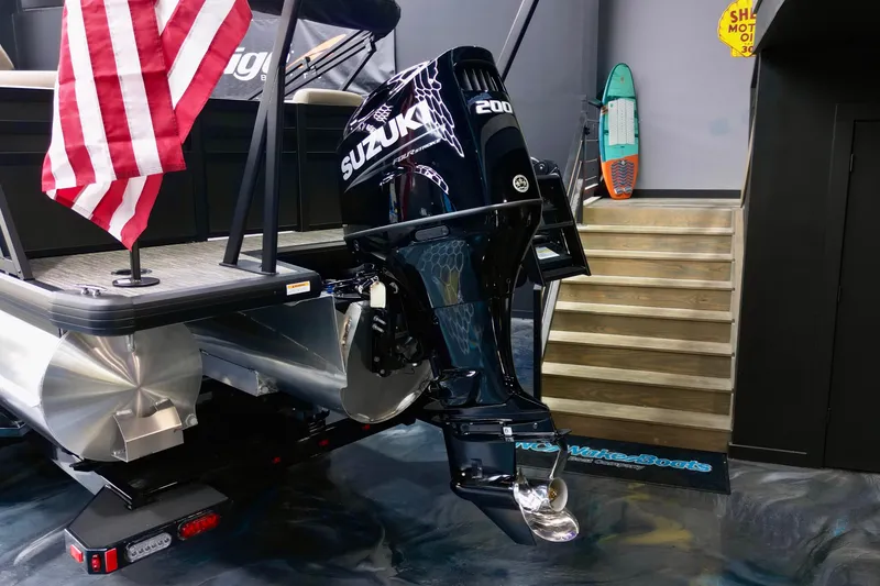 Slide: The Image of 2026 Viaggio Lago X-U 22 boat with Suzuki 200 engine and American flag. - 3