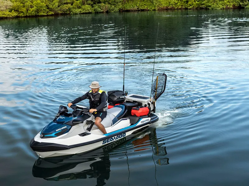Slide: The Image of 2026 Sea-Doo FishPro Sport 170 iDF iBR on calm water. - 3