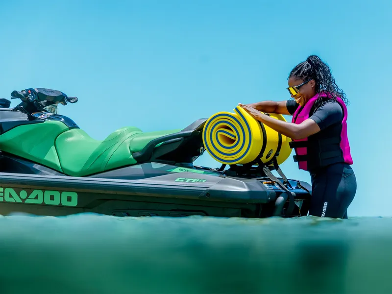 Slide: The Image of Woman on Sea-Doo GTI SE 130 iBR, iDF 2026 with swim roll. - 6