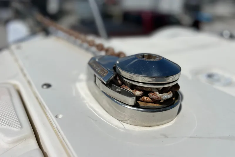 Slide: The Image of Close-up of a boat's anchor windlass on a 1999 World Cat 246 SF. - 15