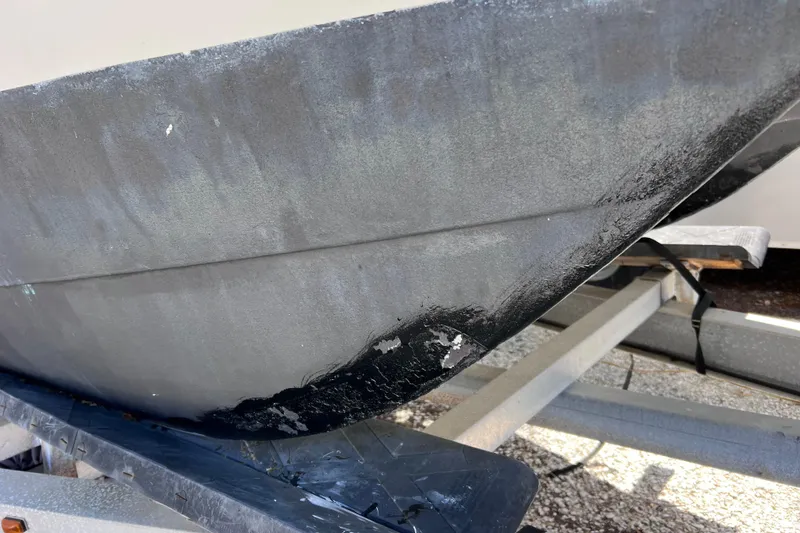 Slide: The Image of Close-up of a 1999 World Cat 246 SF boat hull on a trailer. - 38