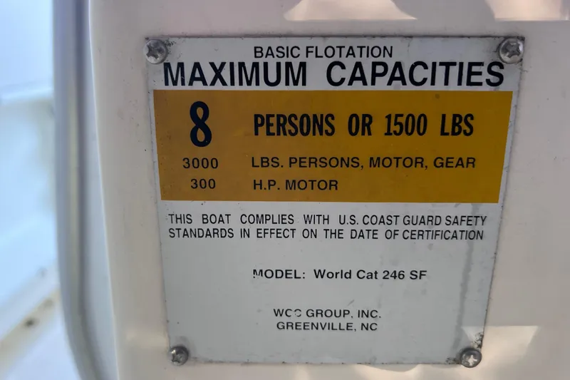 Slide: The Image of Capacity label for 1999 World Cat 246 SF, max 8 persons or 1500 lbs. - 42