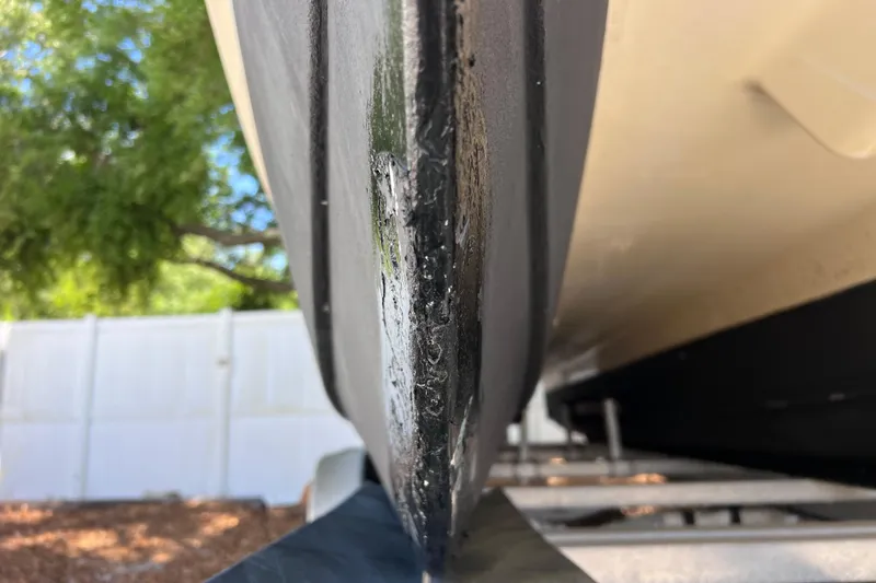 Slide: The Image of Close-up of 1999 World Cat 246 SF boat hull on trailer. - 44
