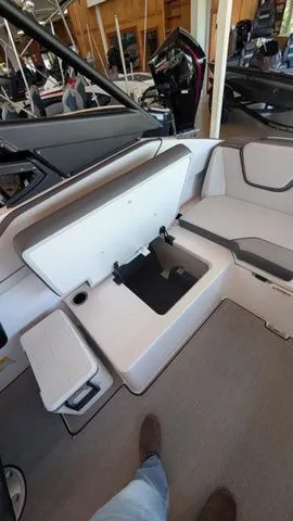 Slide: The Image of Interior of 2026 Yamaha AR250 boat with open seating compartment. - 12
