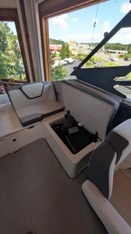 Slide: The Image of Interior of 2026 Yamaha Boats AR250 with modern seating. - 13