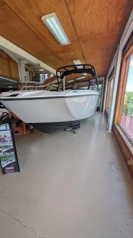 Slide: The Image of 2026 Yamaha AR250 boat in showroom. - 17
