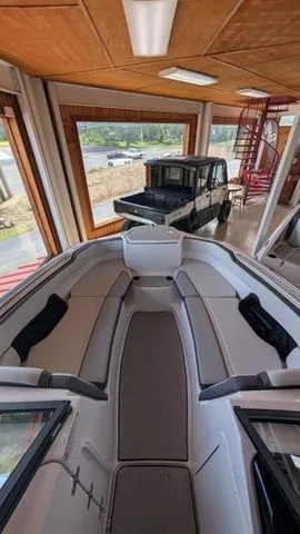 Slide: The Image of Interior view of 2026 Yamaha AR250 boat in a garage. - 3