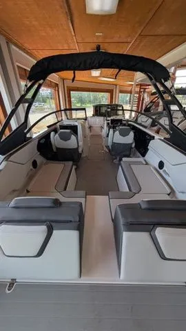 Slide: The Image of Interior view of 2026 Yamaha Boats AR250 with modern seating. - 4