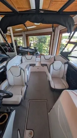 Slide: The Image of Interior view of 2026 Yamaha Boats AR250 with luxurious seating. - 5