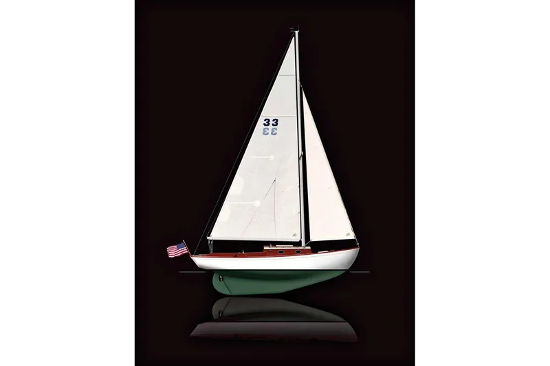 Slide: The Image of Sailboat Bridges Point BP 24, 1998 model, with American flag on dark background. - 2