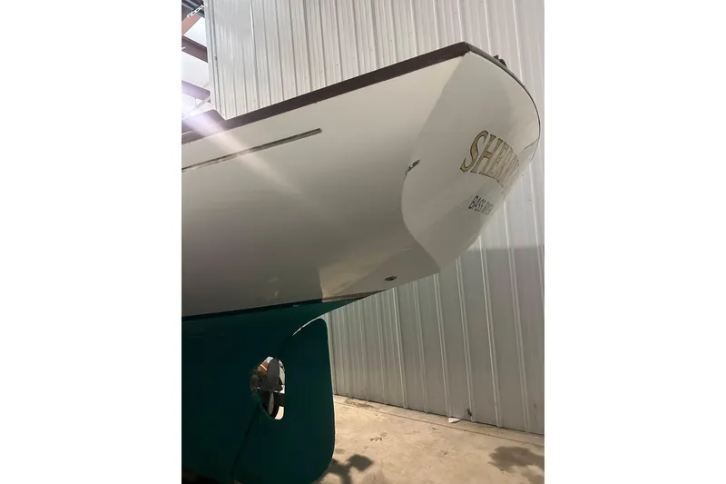 Slide: The Image of Bridges Point BP 24 sailboat, 1998 model, in a storage facility. - 7