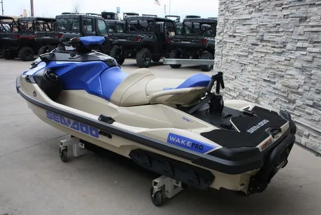 Slide: The Image of 2026 Sea-Doo Wake Pro 230 jet ski in blue and beige. - 6