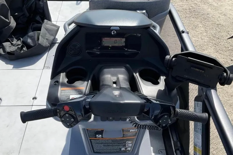 Slide: The Image of 2024 Sea-Doo Switch Cruise 18 dashboard with steering controls and display screen. - 5