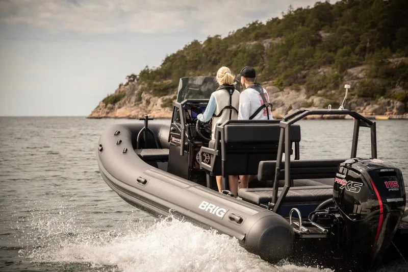 Slide: The Image of Brig Navigator 20 boat on water, 2026 model. - 16