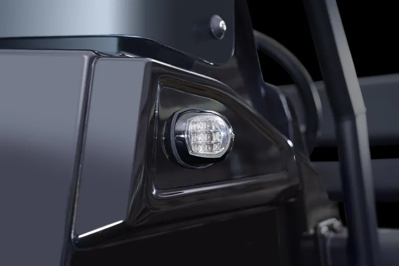 Slide: The Image of Close-up of 2026 Brig Navigator 20 boat's sleek exterior light detail. - 9