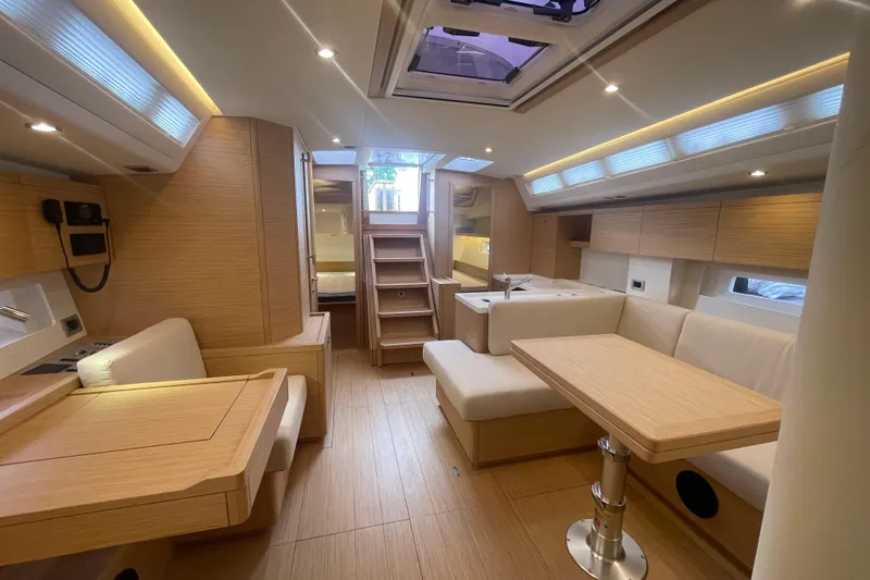 Slide: The Image of Luxurious interior of 2026 Grand Soleil 42 Long Cruise yacht with modern wood finish. - 11