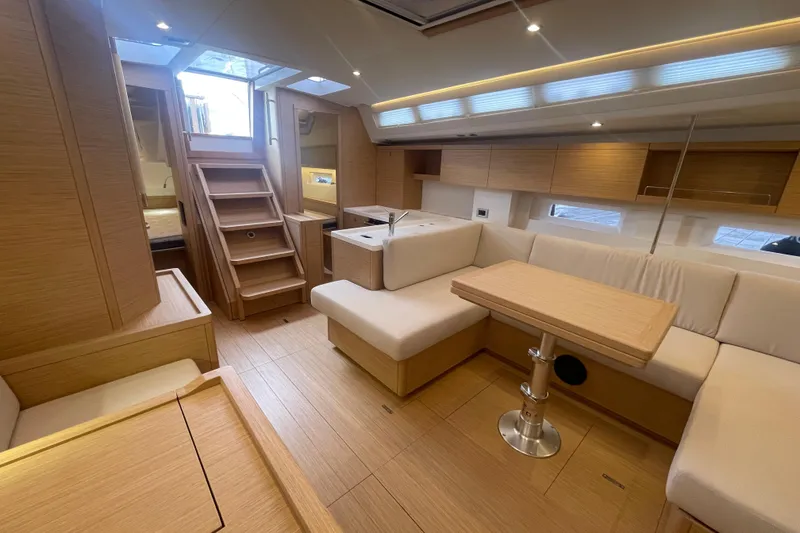 Slide: The Image of Luxurious interior of 2026 Grand Soleil 42 Long Cruise yacht with modern wood finish. - 12