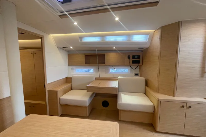 Slide: The Image of Luxurious interior of 2026 Grand Soleil 42 Long Cruise yacht with modern wood finish. - 13