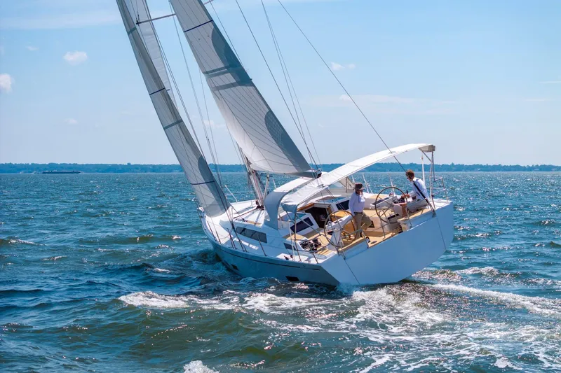 Slide: The Image of Sailing the 2026 Grand Soleil 42 Long Cruise on open waters under clear skies. - 4