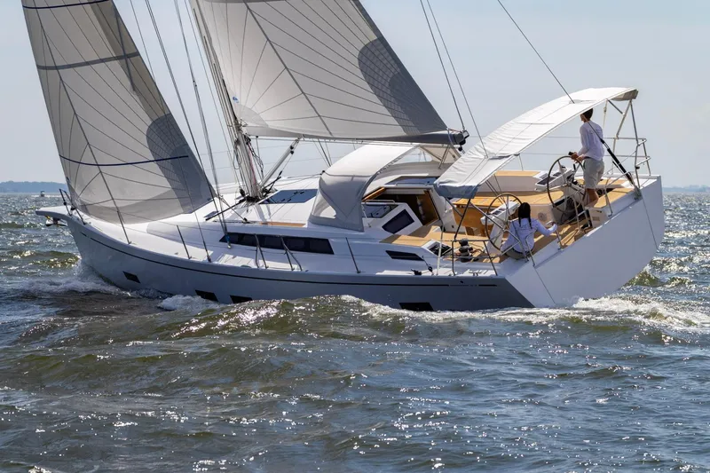 Slide: The Image of Sailing the 2026 Grand Soleil 42 Long Cruise yacht on open waters. - 6