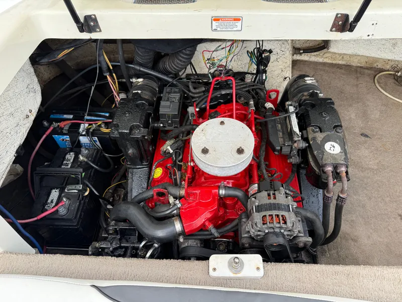Slide: The Image of Engine compartment of a 2007 Caravelle 237 LS Bowrider boat. - 13