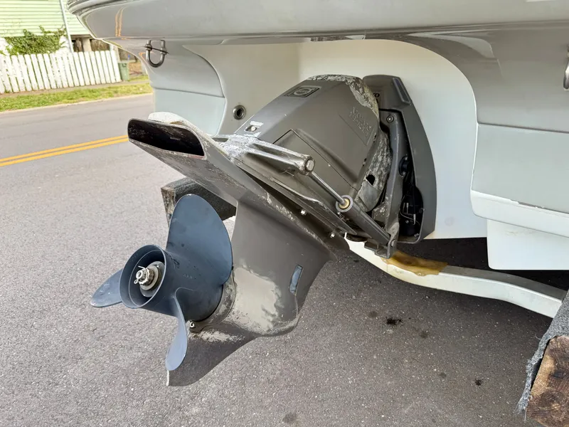 Slide: The Image of 2007 Caravelle 237 LS Bowrider outboard motor on street. - 15