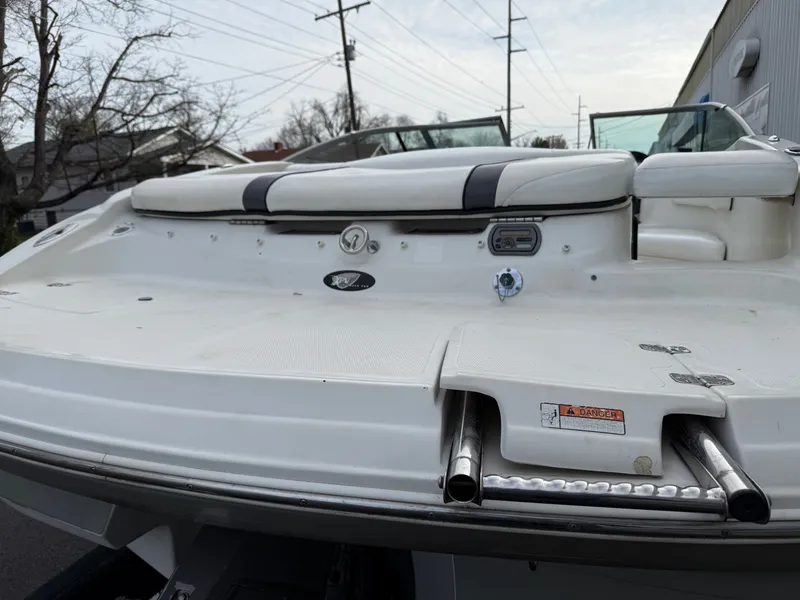 Slide: The Image of 2007 Caravelle 237 LS Bowrider boat rear with seating area. - 16