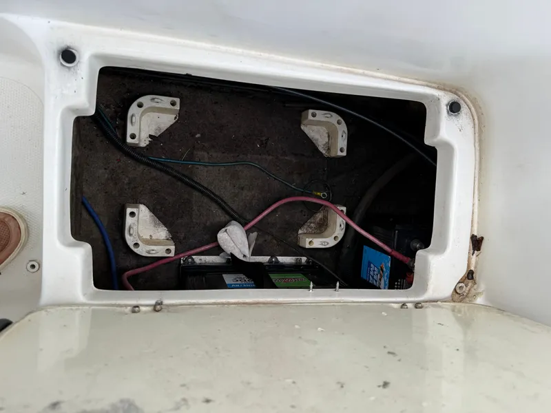 Slide: The Image of Battery compartment of a 2007 Caravelle 237 LS Bowrider boat. - 22