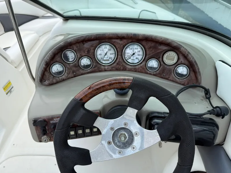 Slide: The Image of Dashboard of a 2007 Caravelle 237 LS Bowrider boat. - 8