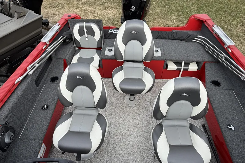 Slide: The Image of 2023 Polar Kraft Frontier 179 WT boat interior with four gray and white seats. - 12