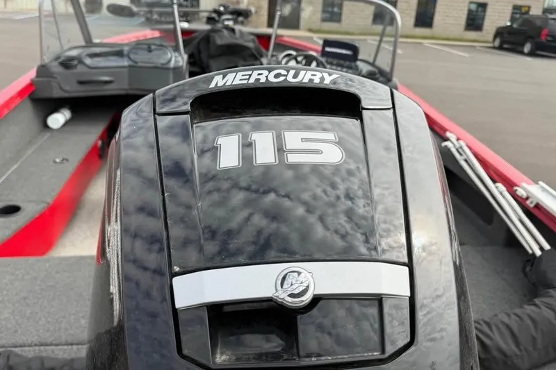 Slide: The Image of 2023 Polar Kraft Frontier 179 WT with Mercury 115 engine, parked outdoors. - 21