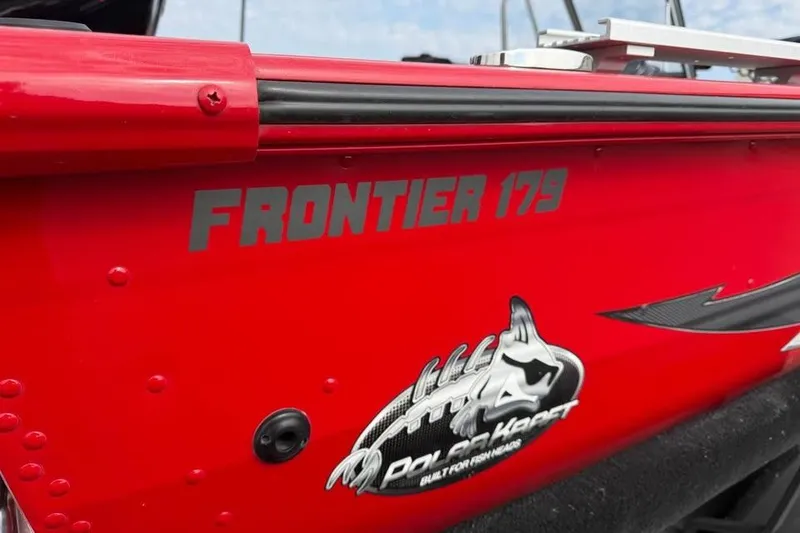Slide: The Image of Red 2023 Polar Kraft Frontier 179 WT boat with logo and branding details. - 23