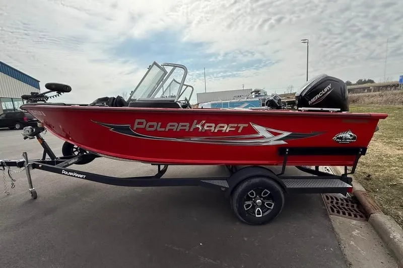 Slide: The Image of 2023 Polar Kraft Frontier 179 WT boat in vibrant red on a trailer. - 3