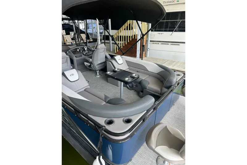 Slide: The Image of 2022 Avalon 2485 LSZ QL pontoon boat with spacious seating and modern interior design. - 7
