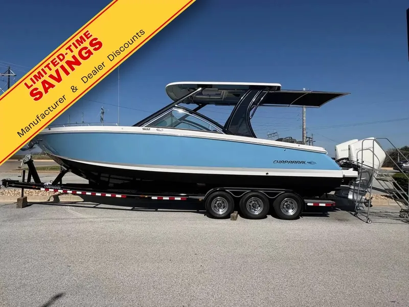 The Image of 2026 Chaparral 310 OSX on a trailer with a promotional banner for discounts. - 1