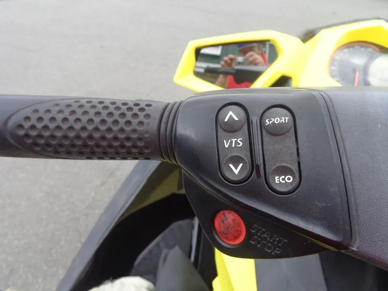 Slide: The Image of Handlebar of 2015 Sea-Doo GTR 215 with control buttons. - 11