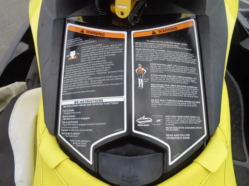 Slide: The Image of 2015 Sea-Doo GTR 215 warning labels and iBR instructions. - 13