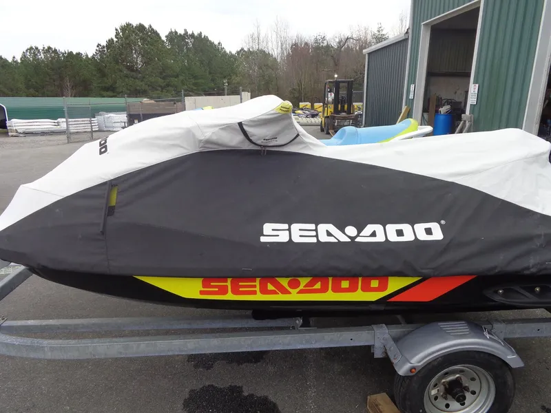 Slide: The Image of 2015 Sea-Doo GTR 215 jet ski covered on trailer. - 28